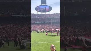 Ashanti singing the national anthem at the Chiefs vs Bengals game.  The crowd had to take over