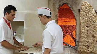 Baking bread / Baking bread on stone / Sangak bread, the most traditional bread in Iran