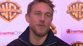 Charlie Hunnam recalls sword fights and dart injuries with older brother