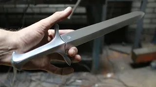 Forging a twisted bar Damascus dagger, the complete movie.