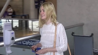 Elle Fanning Goes Braless Through LAX