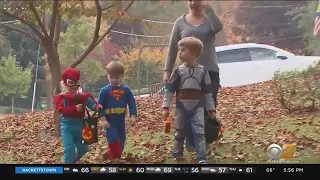 Families Preparing For Halloween Fun