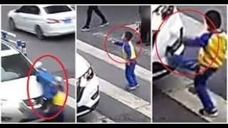 Child kicks car that knocked over his mother at zebra crossing (Video) Any Articles News