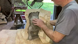 De-molding Sitting French Bulldog mold. Latex and fiberglass.