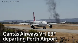 Qantas Airways (VH-EBF) departing Perth Airport with smoke from a Fire Services exercise.