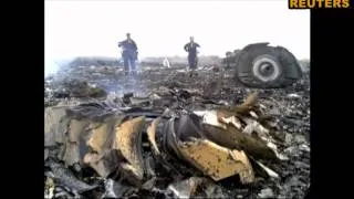 Фотослайд сбитого террористами самолета на Донбассе
