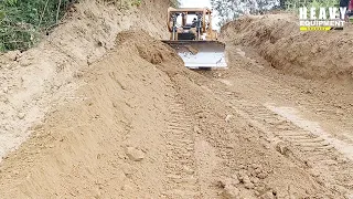 Caterpillar D6R XL Bulldozer Operator Is Very Professional Working on Tidying Plantation Roads