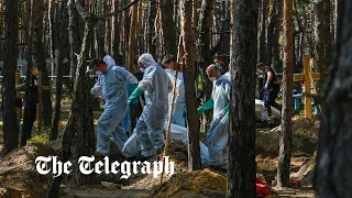 Ukraine: Children among bodies exhumed at mass burial site in city of Izyum