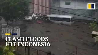 Flash floods in Indonesia kill 2, leave at least 8 missing as heavy rains hit East Java towns