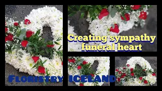 How to make funeral sympathy heart in oasis base with white chrysanthemum and red rose petals.