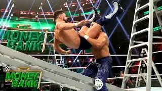Andrade powerbombs Finn Bálor onto a ladder: WWE Money in the Bank 2019