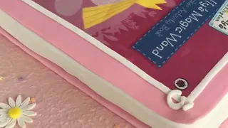 Ben & holly book shape cake