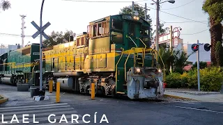 GP38-2 y SW1504 pasando crucero con semáforos y campanas, entrando a Tlatilco línea N y mentada de m