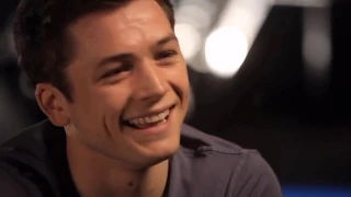 Taron Egerton being painfully attractive for 6 minutes straight