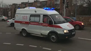 Ambulance with siren on a traffic jam