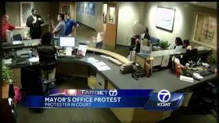 Video shows child aiding in Mayor's Office protest