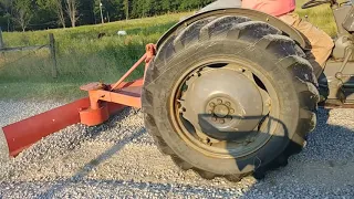 1950 Ferguson TO-20 grading driveway.