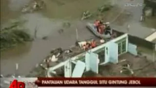 Raw Video: Indonesian Dam Bursts, Dozens Dead