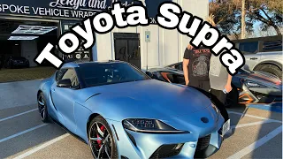 Toyota Supra 2021 wrapped in Matte Metallic Frosty Blue with black accents… by Jekyll and Hydes.