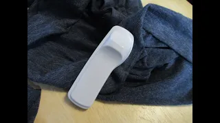 Removing a store security tag from clothing