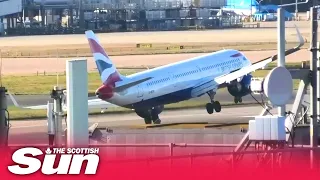 Moment Aberdeen to London flight bounces on runway before aborting landing amid Storm Corrie