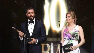 Bariş Arduç receiving the International Actor of the Year award from the BIAF  - 12 July 2019