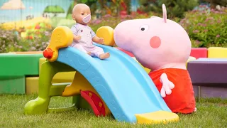 A toy slide for a Baby Born doll. Baby dolls & Baby Alive. Toy Peppa Pig is a babysitter.