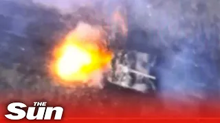 Ukrainian kamikaze drone crashes into Russian tank in huge explosion