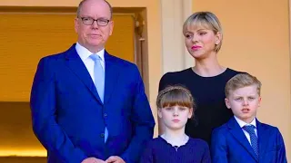 Albert and Charlene of Monaco on the balcony with their children for Corpus Christi