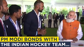 PM Modi talks cricket with hockey players...Find out why!