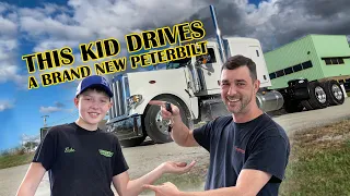 Kid drives a BRAND NEW Peterbilt Truck!