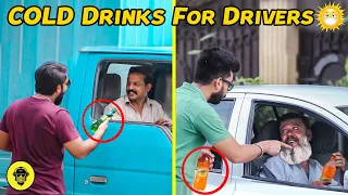 Giving Cold Drinks To Drivers In Heatwave