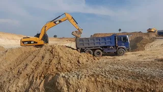 Daily excavation of Caterpillar and loading dumtrucks #cambodia #automobile #caterpillar #boardgame