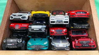 Box full of model cars, Mercedes maybach s650, Lamborghini, Benley, Honda typeR, Bugatti, Brabus.