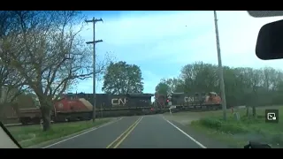 CN 2879,CN 3820 Leading A Westbound Intermodal Container Through Climax Michigan 5-2-24