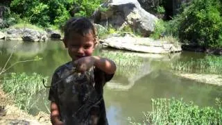 Wade Wilson eating worms on the San Gabriel River in Georgetown, TX.