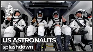 ISS astronauts splash down on SpaceX craft