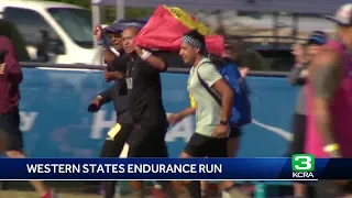 Ultra-runners cross the finish line at the Western States 100-mile endurance run