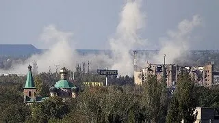 Pro-Russian rebels and Ukrainian army battle for Donetsk airport