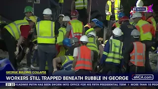 George Building Collapse | Rescue teams bring another worker to the surface