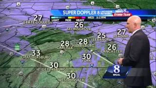Snow tapering off, flurries continue overnight