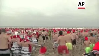 People across Europe take to icy waters for a new year's dip