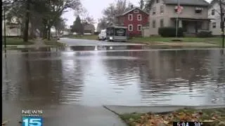 Leaves block drains, flooding roadways