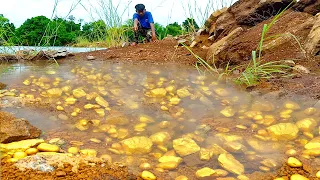 wow wow amazing day! gold miner found a lot of gold treasure under stone million years