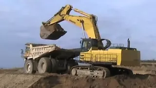 Komatsu PC1100SP loading Cat 777C