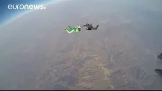 Skydiver Luke Aikins makes parachute-free jump from from 7.6km (25,000ft)