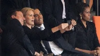 Obama snaps 'selfie' at Mandela memorial