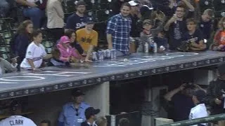 Miggy tosses a young fan a foul ball