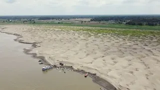 In the Amazon, communities next to the world's most voluminous river are queuing for water