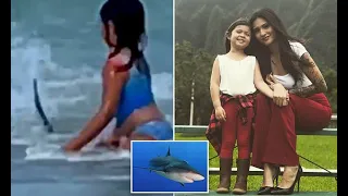 Terrified Hawaiian girl 6 runs from shark that circled her just feet away from shoreline